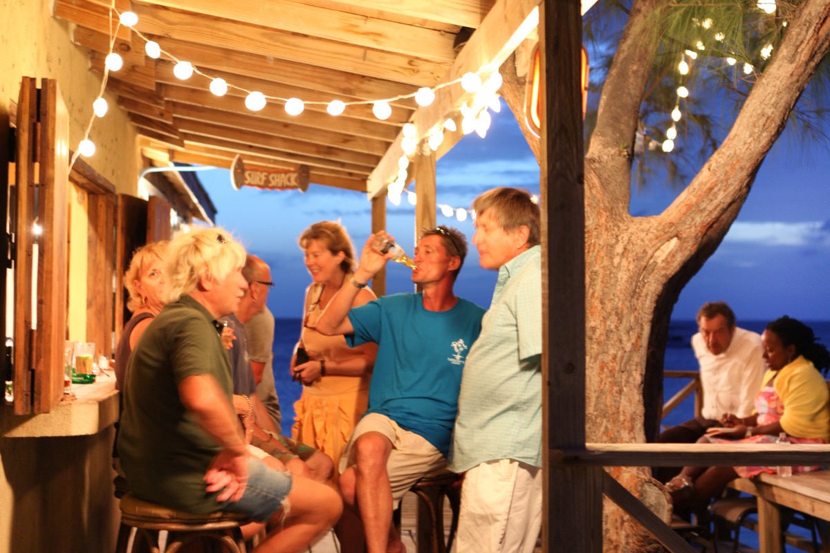 The sunset lime at Sandbar, across from Manta House on Town Beach, Grand Turk, Turks and Caicos.